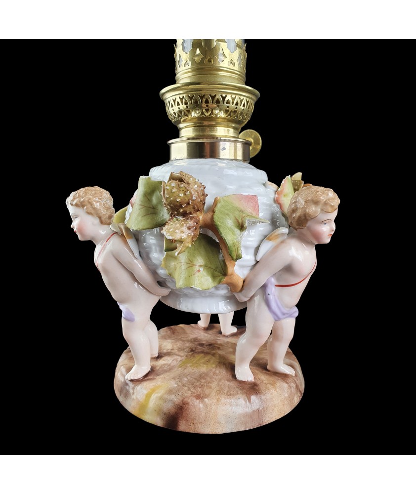 Pair of Antique Von Schierholz Figural Oil Lamps